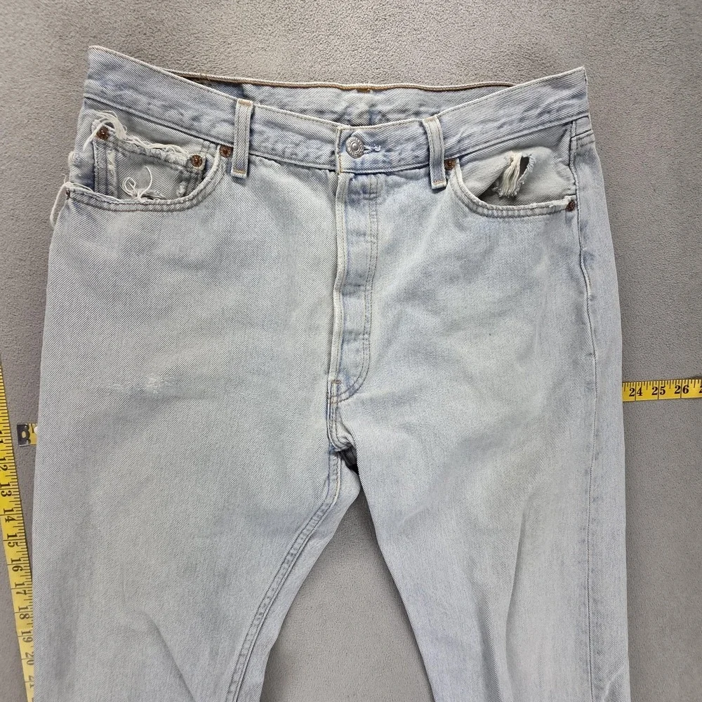 Vintage Levis 501 Jeans Mens Blue Light Wash Made In USA Button Fly Fits 32x32